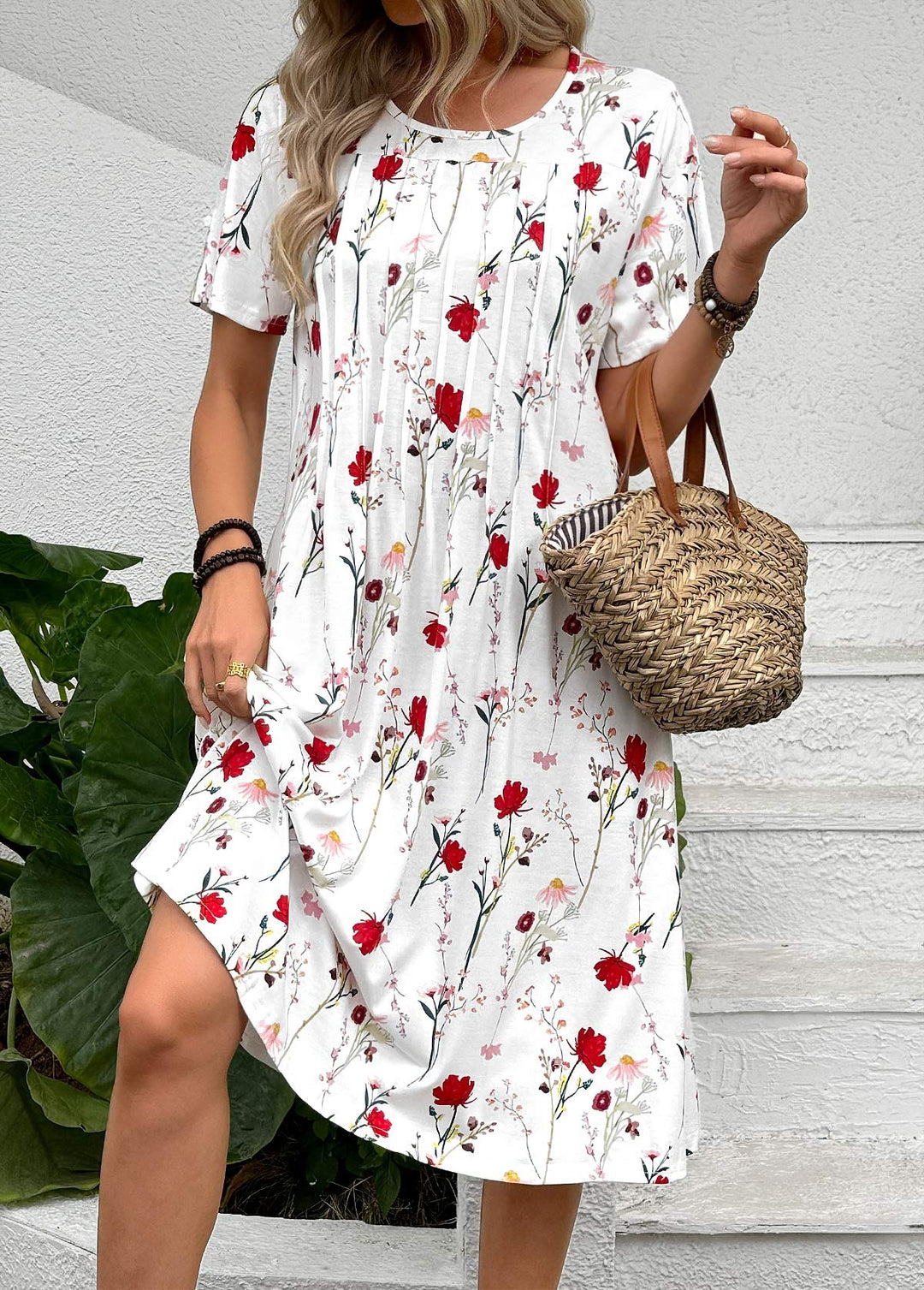 Robe à imprimé floral et coutures plissées