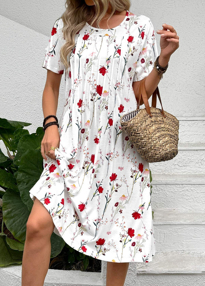 Robe à imprimé floral et coutures plissées