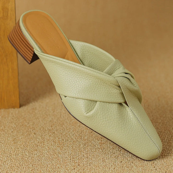 Mules en cuir à nœud papillon