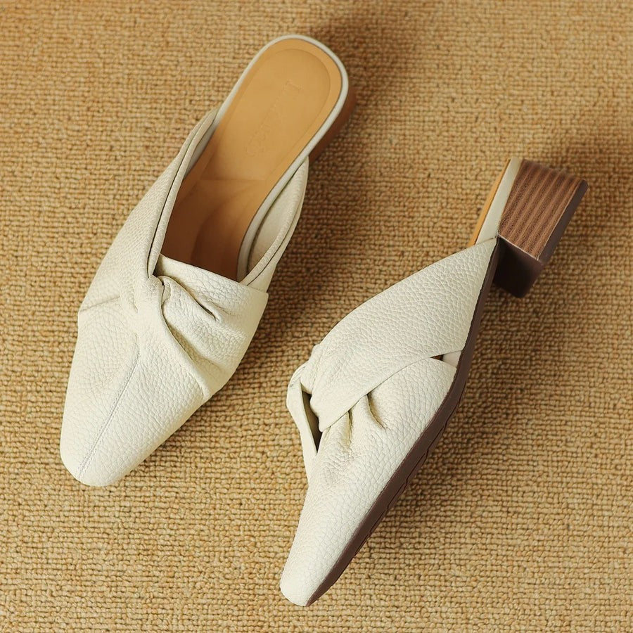 Mules en cuir à nœud papillon