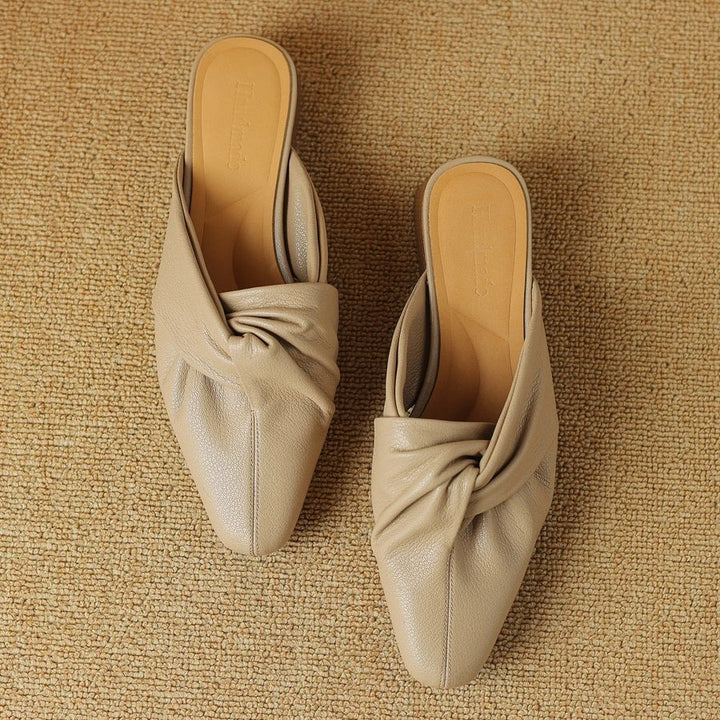 Mules en cuir à nœud papillon