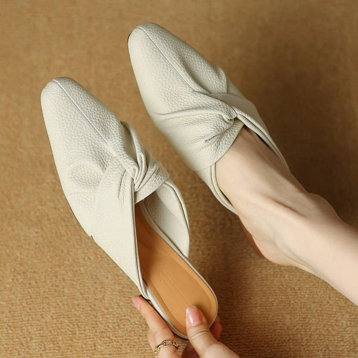 Mules en cuir à nœud papillon