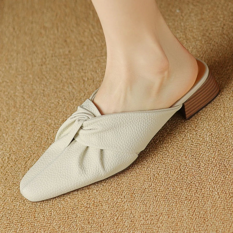 Mules en cuir à nœud papillon