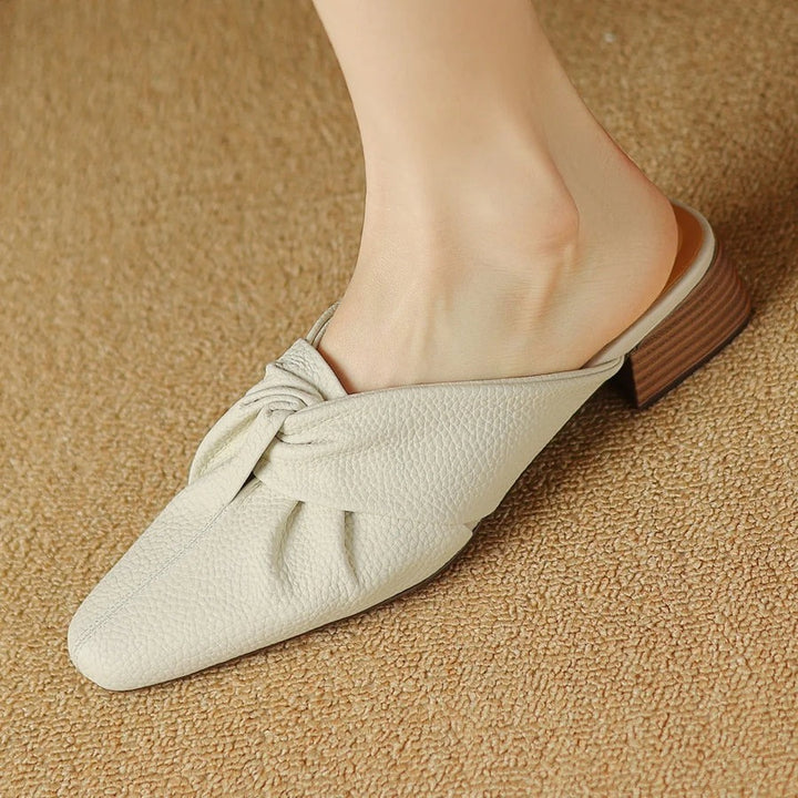 Mules en cuir à nœud papillon