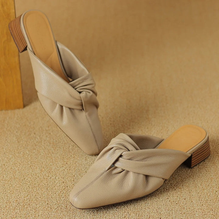 Mules en cuir à nœud papillon