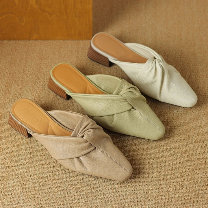 Mules en cuir à nœud papillon