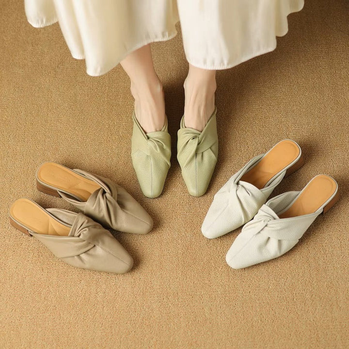 Mules en cuir à nœud papillon