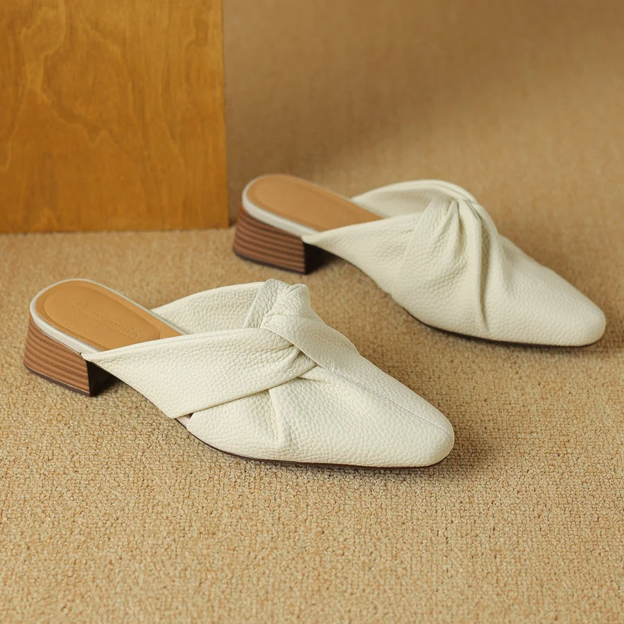 Mules en cuir à nœud papillon