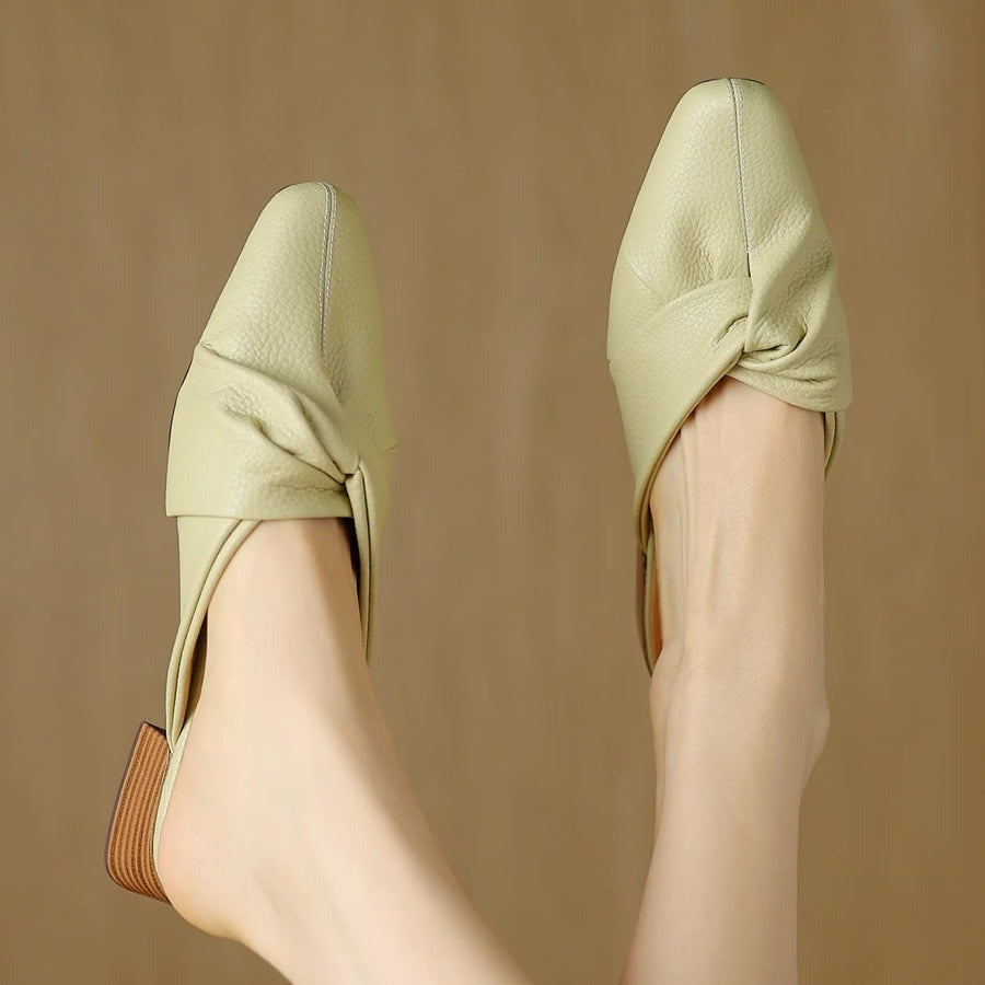 Mules en cuir à nœud papillon