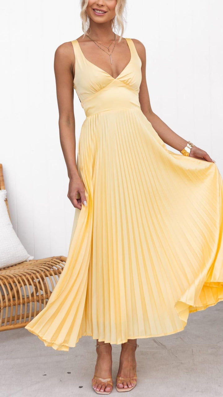 Abito lungo giallo plissettato